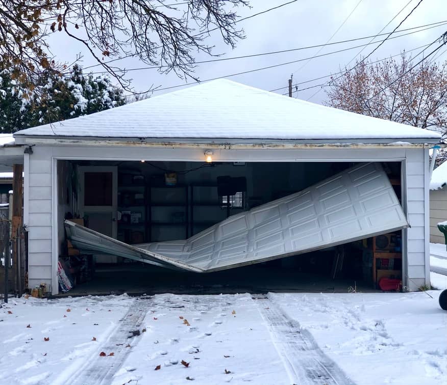 Obvious garage door damage.