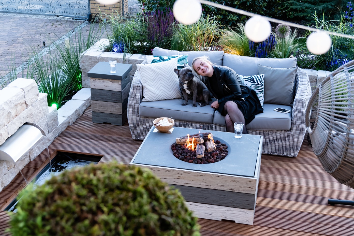 Gas fire pit on a composite deck.