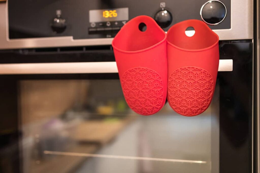 Silicone oven mits will protect your hands when pulling hot items out of the oven. 